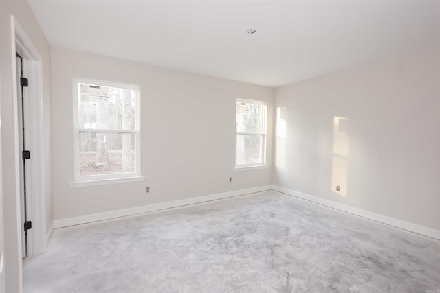 unfurnished room featuring a wealth of natural light