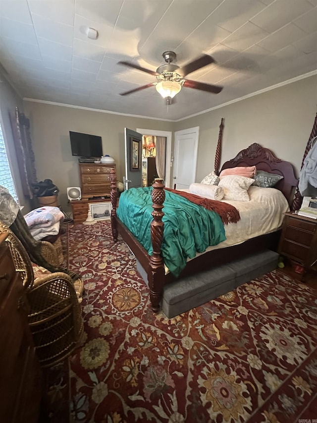 bedroom featuring ceiling fan and ornamental molding