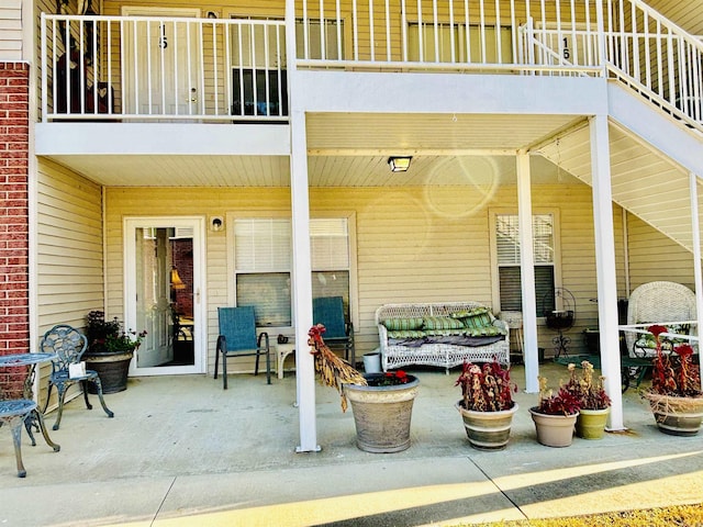 view of patio / terrace featuring a balcony and an outdoor hangout area