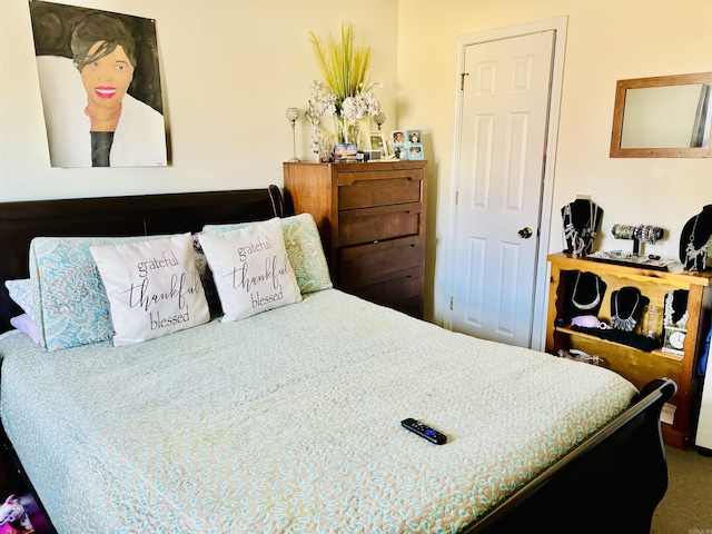 bedroom featuring carpet