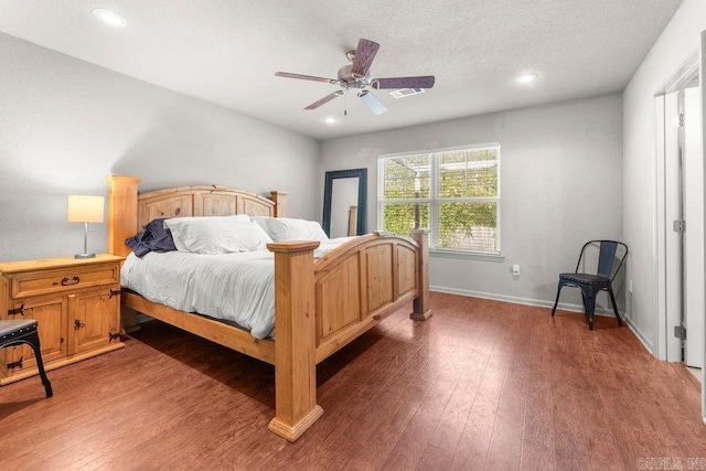 bedroom featuring ceiling fan and wood-type flooring