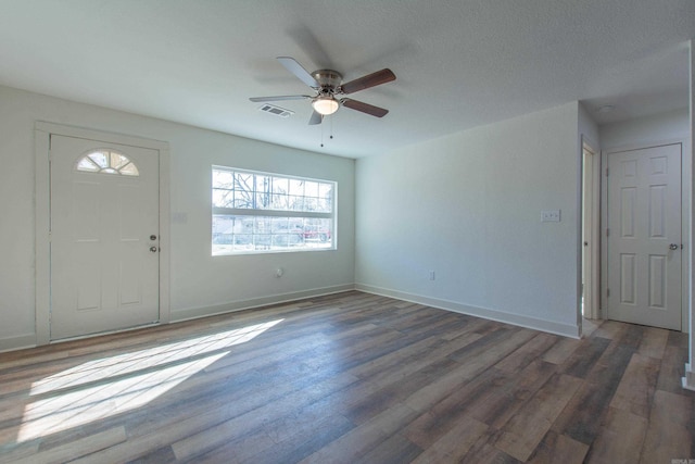 entryway featuring ceiling fan and dark hardwood / wood-style floors