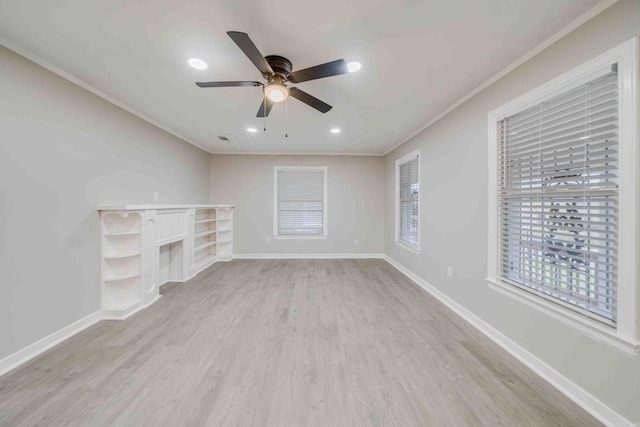 unfurnished living room featuring ceiling fan, light hardwood / wood-style flooring, and crown molding