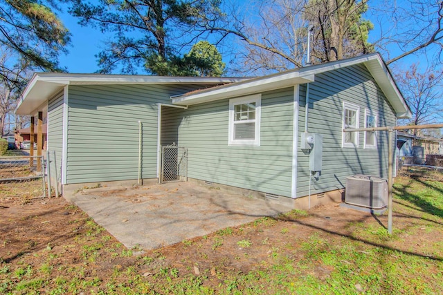 back of property featuring central AC and a patio area