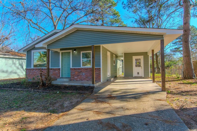 view of front of house featuring a carport