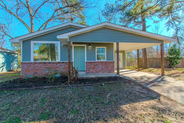 view of front of house featuring a carport