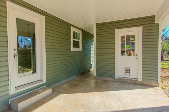 doorway to property with a porch