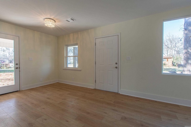 foyer with light hardwood / wood-style flooring