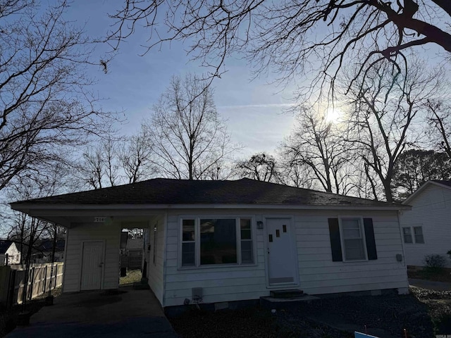 bungalow-style house with a carport