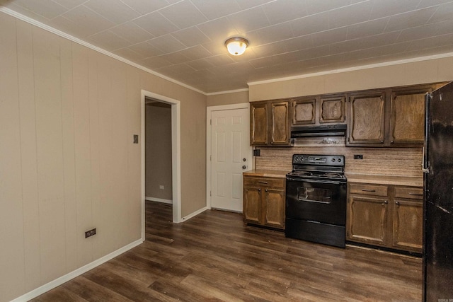 kitchen featuring black appliances, dark hardwood / wood-style flooring, and ornamental molding