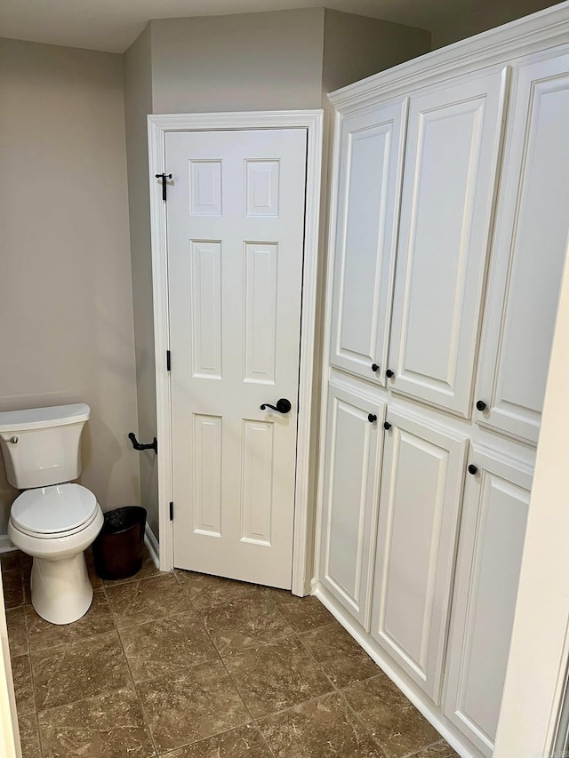 bathroom featuring toilet