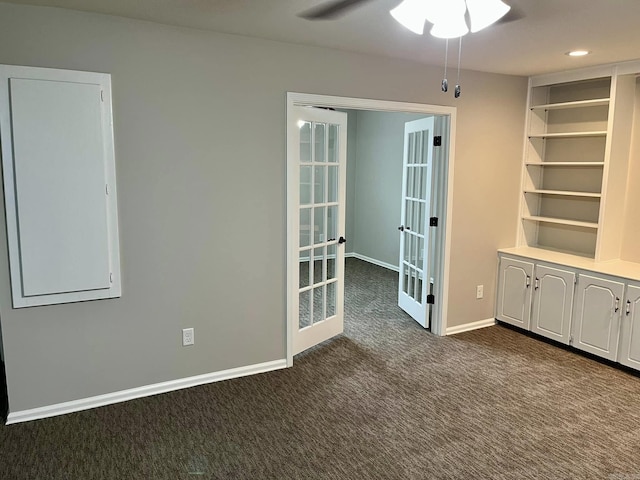 interior space with ceiling fan and french doors