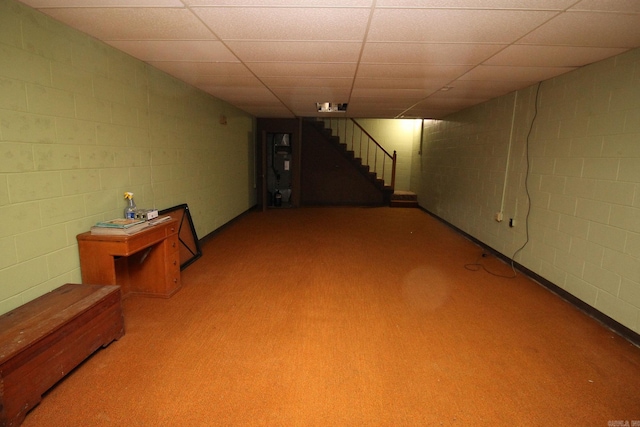 basement featuring carpet flooring