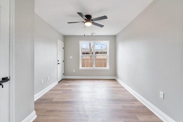 unfurnished room with light hardwood / wood-style floors and ceiling fan