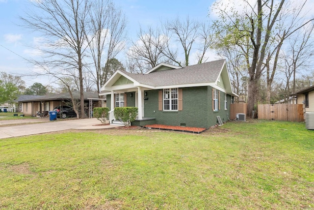 view of front facade with central AC, a front lawn, and covered porch