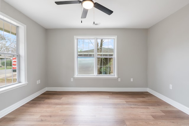 unfurnished room with light hardwood / wood-style floors and ceiling fan