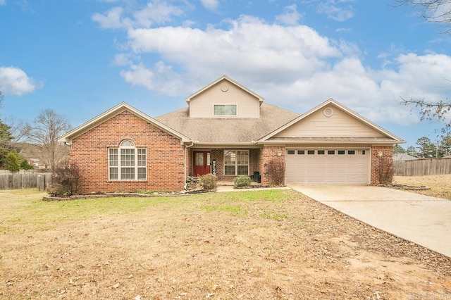 front facade featuring a garage and a front lawn