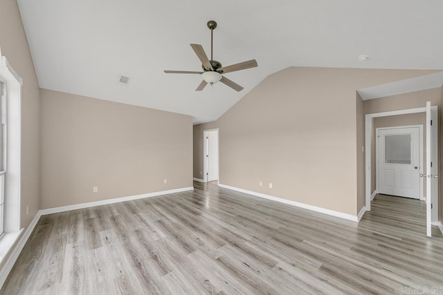 unfurnished living room featuring ceiling fan, light hardwood / wood-style floors, and lofted ceiling