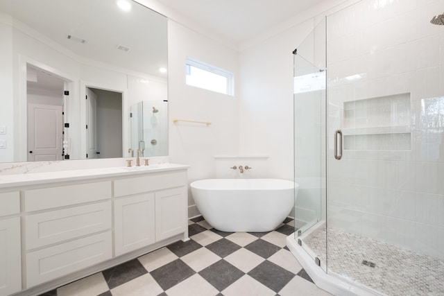 bathroom featuring crown molding, vanity, and plus walk in shower