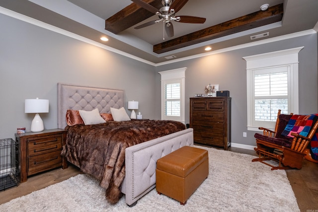 bedroom featuring ceiling fan, light hardwood / wood-style floors, and multiple windows