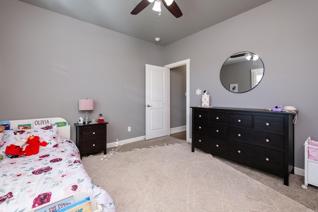 bedroom featuring ceiling fan and light colored carpet