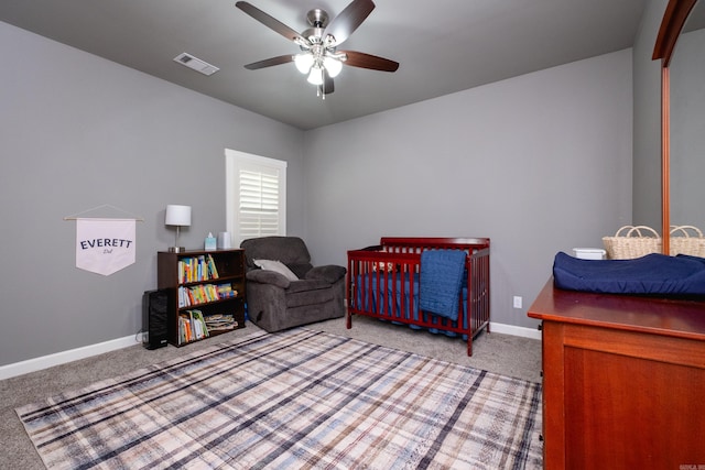 carpeted bedroom featuring ceiling fan