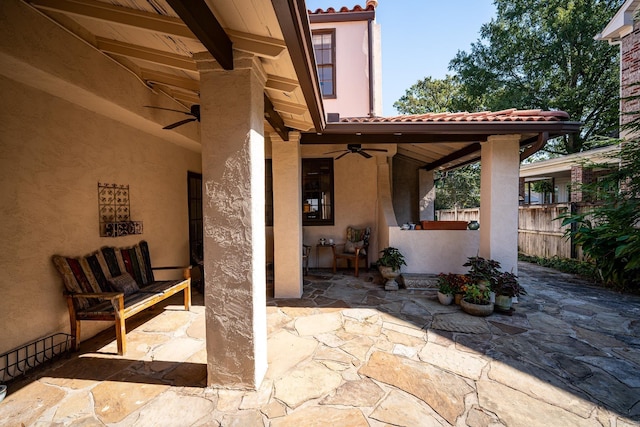 view of patio / terrace featuring ceiling fan