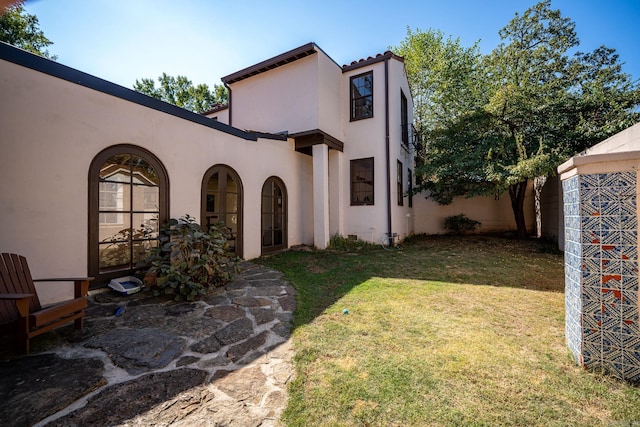 exterior space featuring a lawn