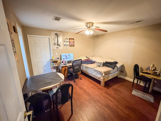 bedroom with hardwood / wood-style flooring and ceiling fan