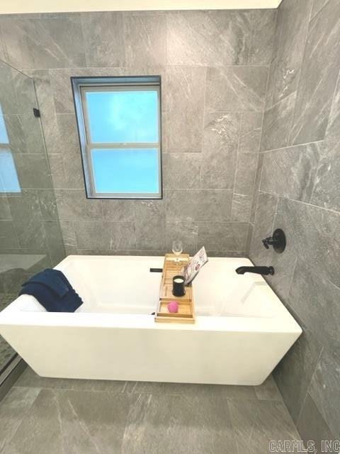 bathroom with a bath