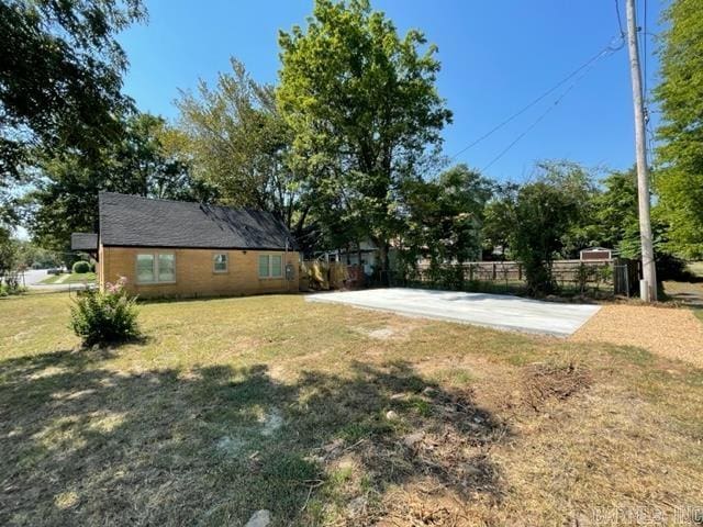 view of yard with basketball court