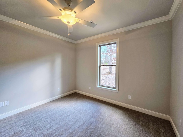 empty room with crown molding, ceiling fan, and carpet flooring