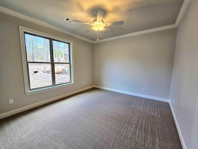 carpeted empty room with ornamental molding and ceiling fan