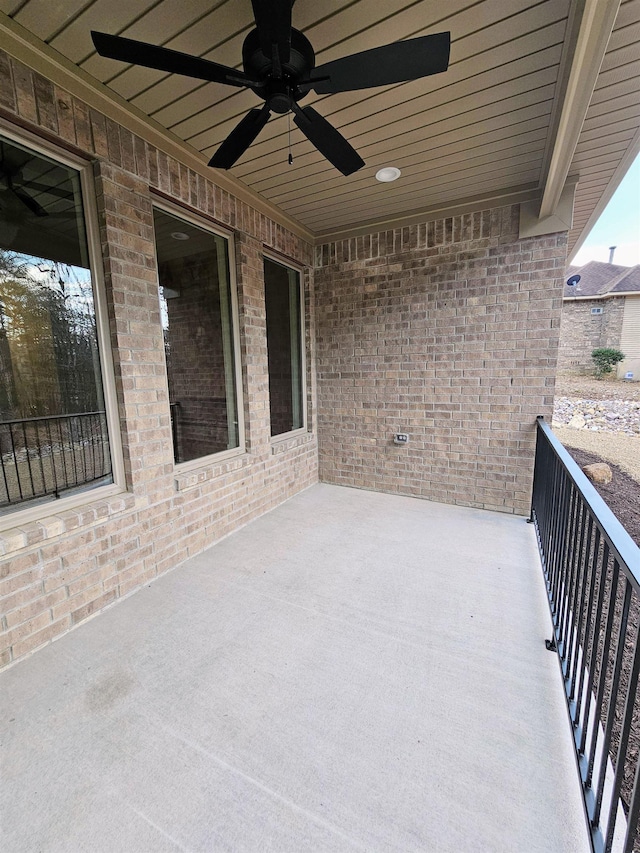 view of patio featuring ceiling fan