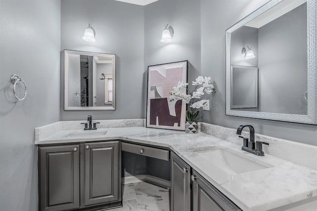 bathroom featuring crown molding and vanity