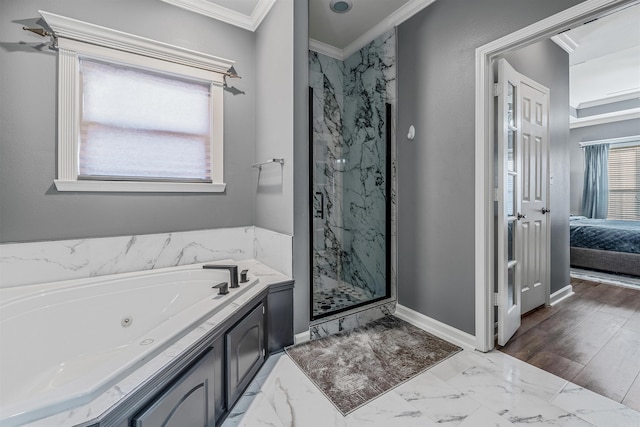 bathroom featuring shower with separate bathtub and crown molding