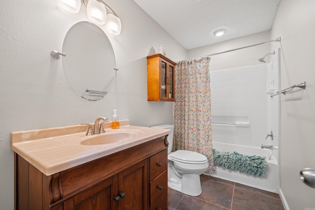 full bathroom featuring shower / bath combo with shower curtain, vanity, a textured ceiling, and toilet