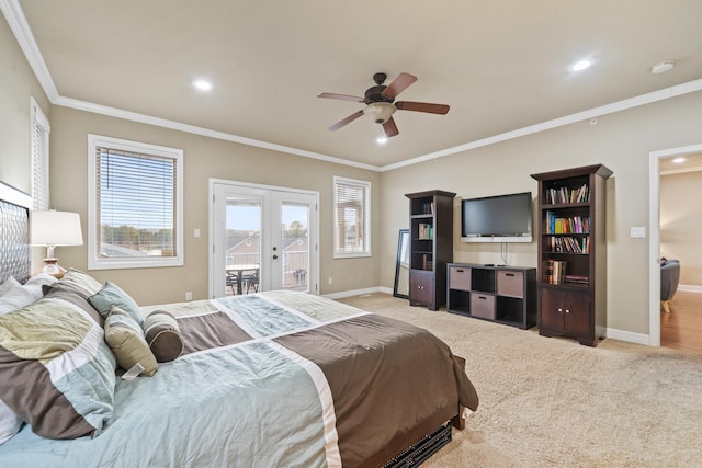 carpeted bedroom featuring access to exterior, french doors, ceiling fan, and ornamental molding