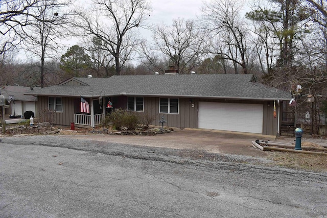 ranch-style home featuring a garage