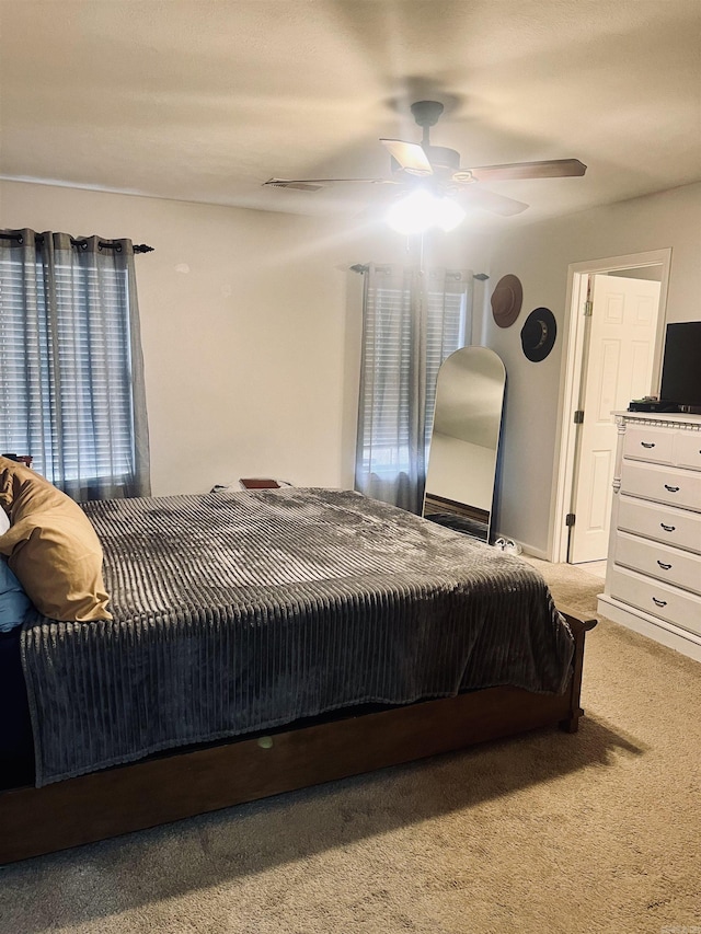 bedroom featuring carpet flooring and ceiling fan