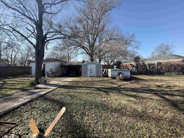 view of yard with a storage shed