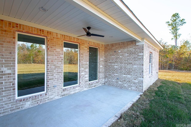 view of patio featuring ceiling fan