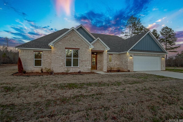 view of front of property featuring a garage