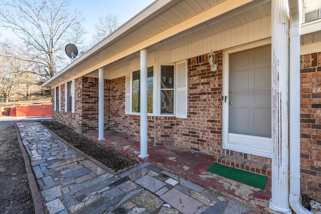 doorway to property with a porch