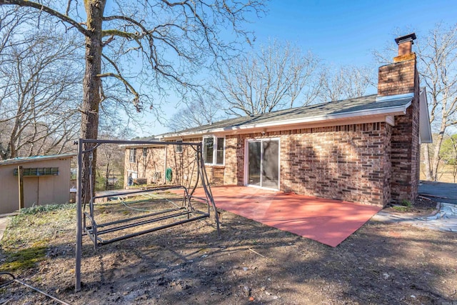 rear view of house with a patio area