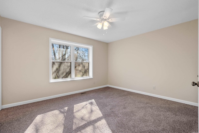 unfurnished room featuring carpet flooring and ceiling fan