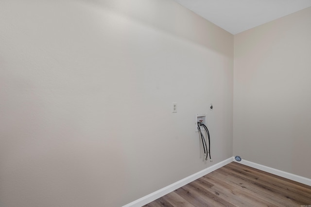 laundry area featuring hookup for an electric dryer, wood-type flooring, and hookup for a washing machine