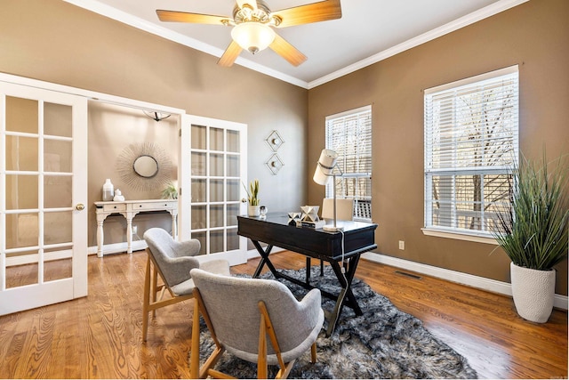 office with crown molding, french doors, ceiling fan, and hardwood / wood-style floors