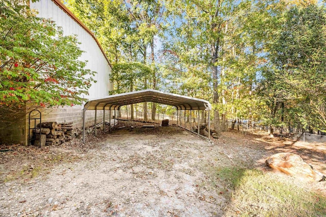 exterior space with a carport