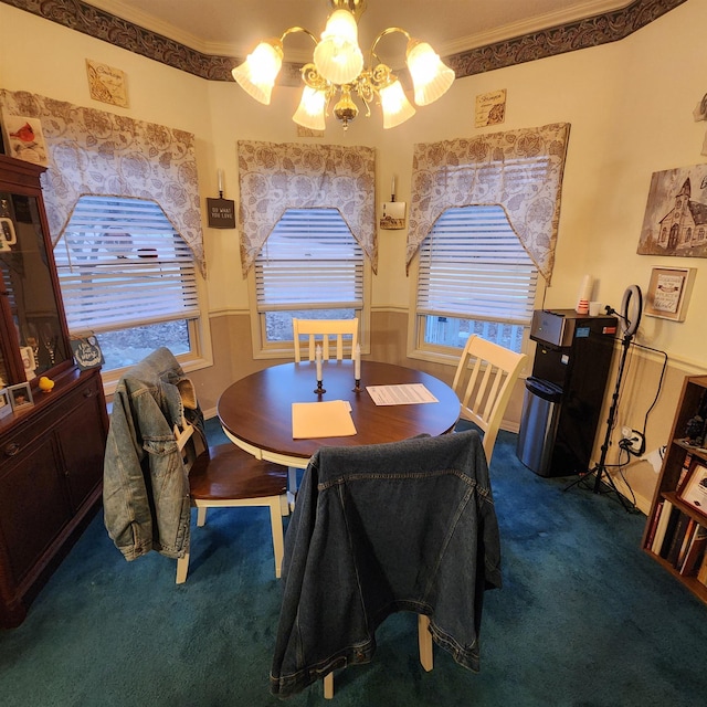 dining space with an inviting chandelier, dark carpet, and ornamental molding